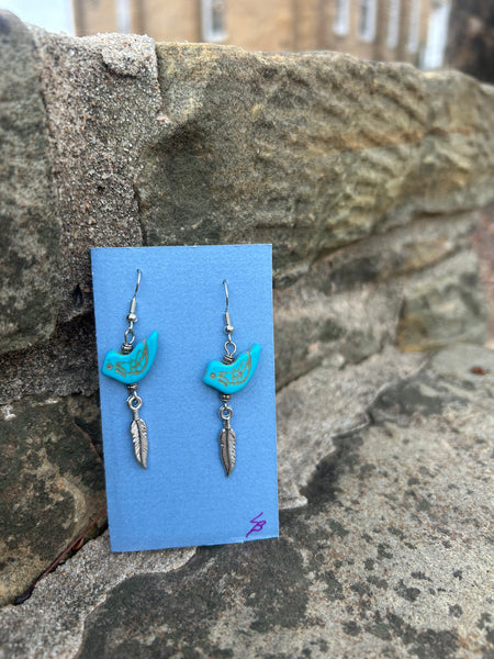 Bird and feather charm earrings made by Laura Bushyhead